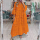 Robe en coton brodé à col en V et manches cloche