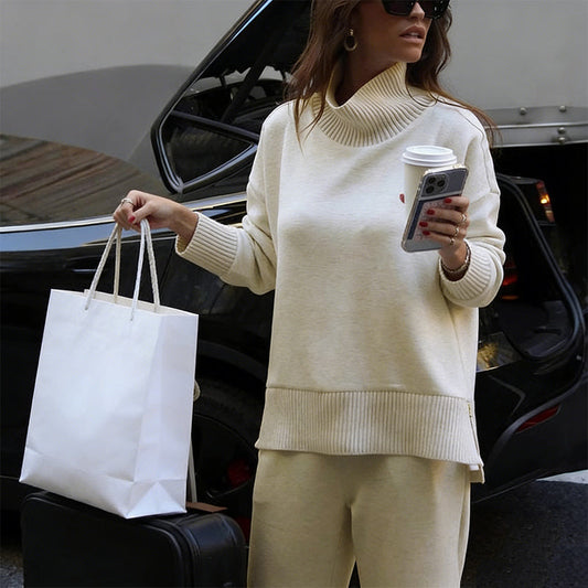Ensemble sweat-shirt à col montant et pantalon à fermeture éclair sur le côté