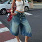 Jupe-culotte en jean à jambes larges et boutons multiples pour femme