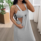 Robe longue sans manches style deux pièces avec découpes sur les côtés