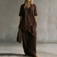 Ensemble femme composé d'un haut asymétrique et d'un pantalon à jambes larges