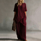 Ensemble femme composé d'un haut asymétrique et d'un pantalon à jambes larges